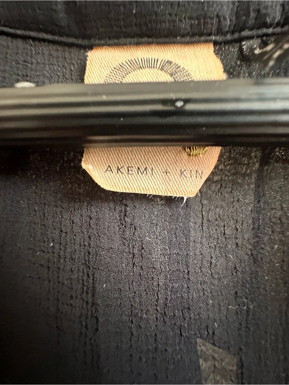 Anthropologie’s Sleeveless Black Asymmetrical Handkerchief-Hem Dress